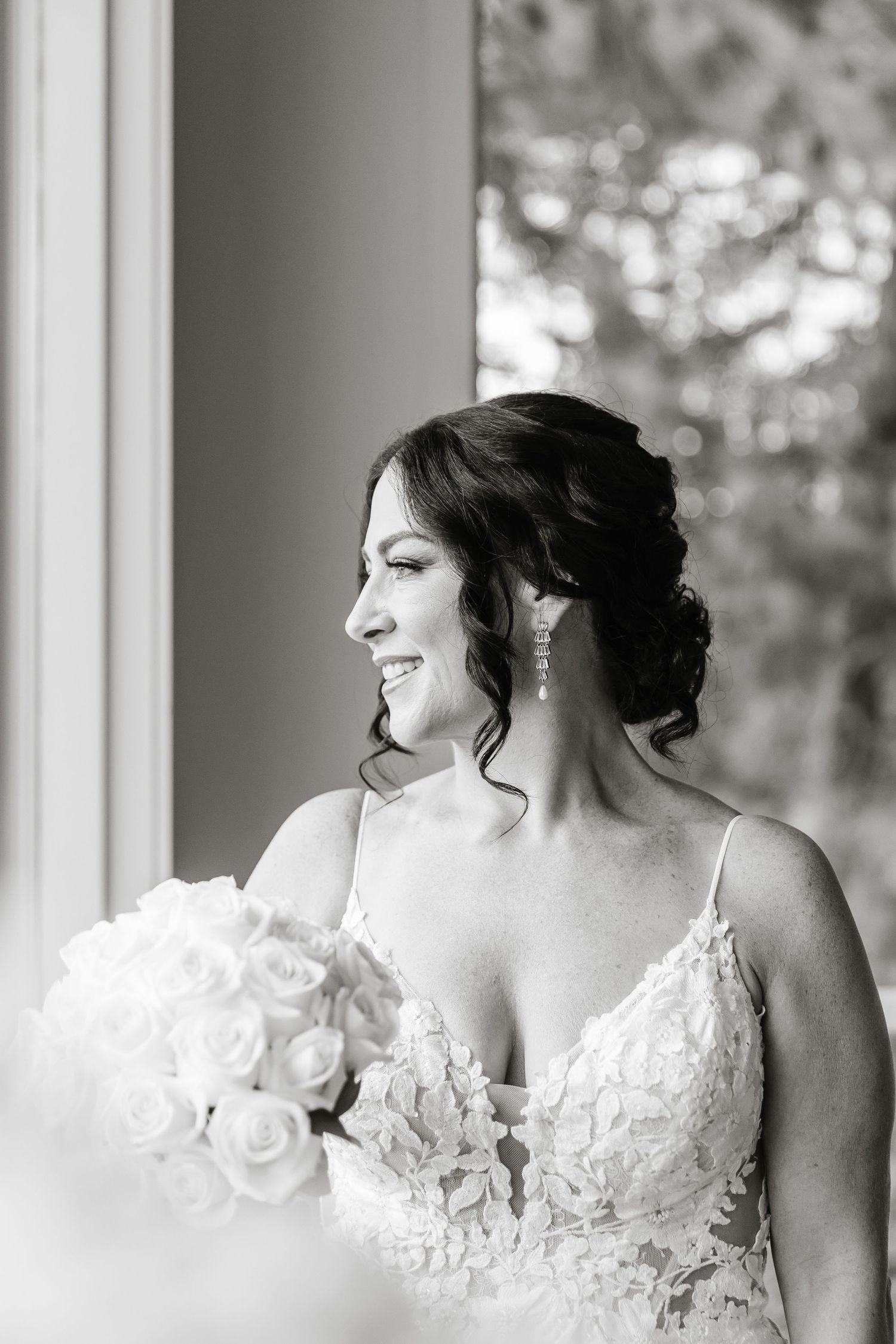 A series of profile shots showing the intricate lace details of a white wedding dress.