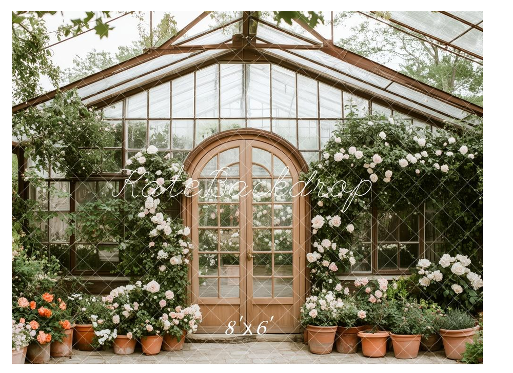 A charming greenhouse backdrop with arched wooden doors, climbing roses, and potted flowers in an 8x6 photography set.