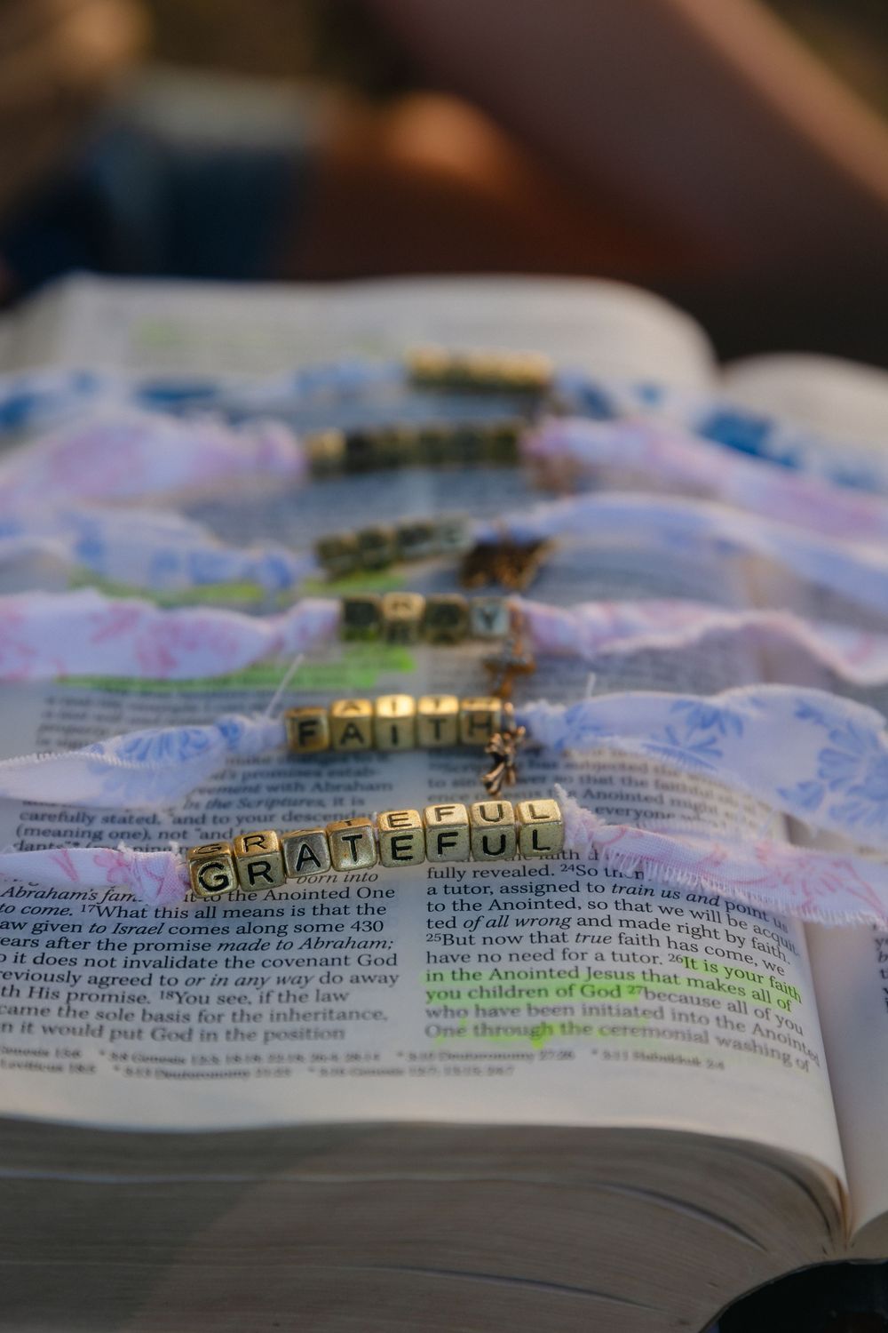 A series of close-up photos showing Bible pages with highlighted text and the word 'grateful' visible in sequential frames.