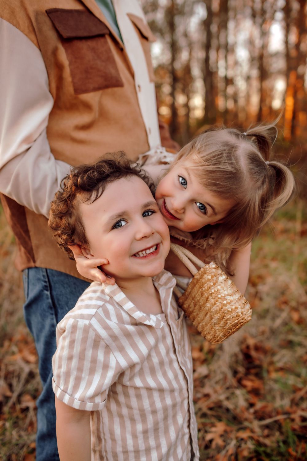 Father and kids together in a candid moment during family photo session in Mooresville NC