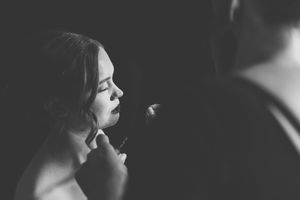 Romantic black and white photo montage showing seven intimate moments between a couple in various poses.