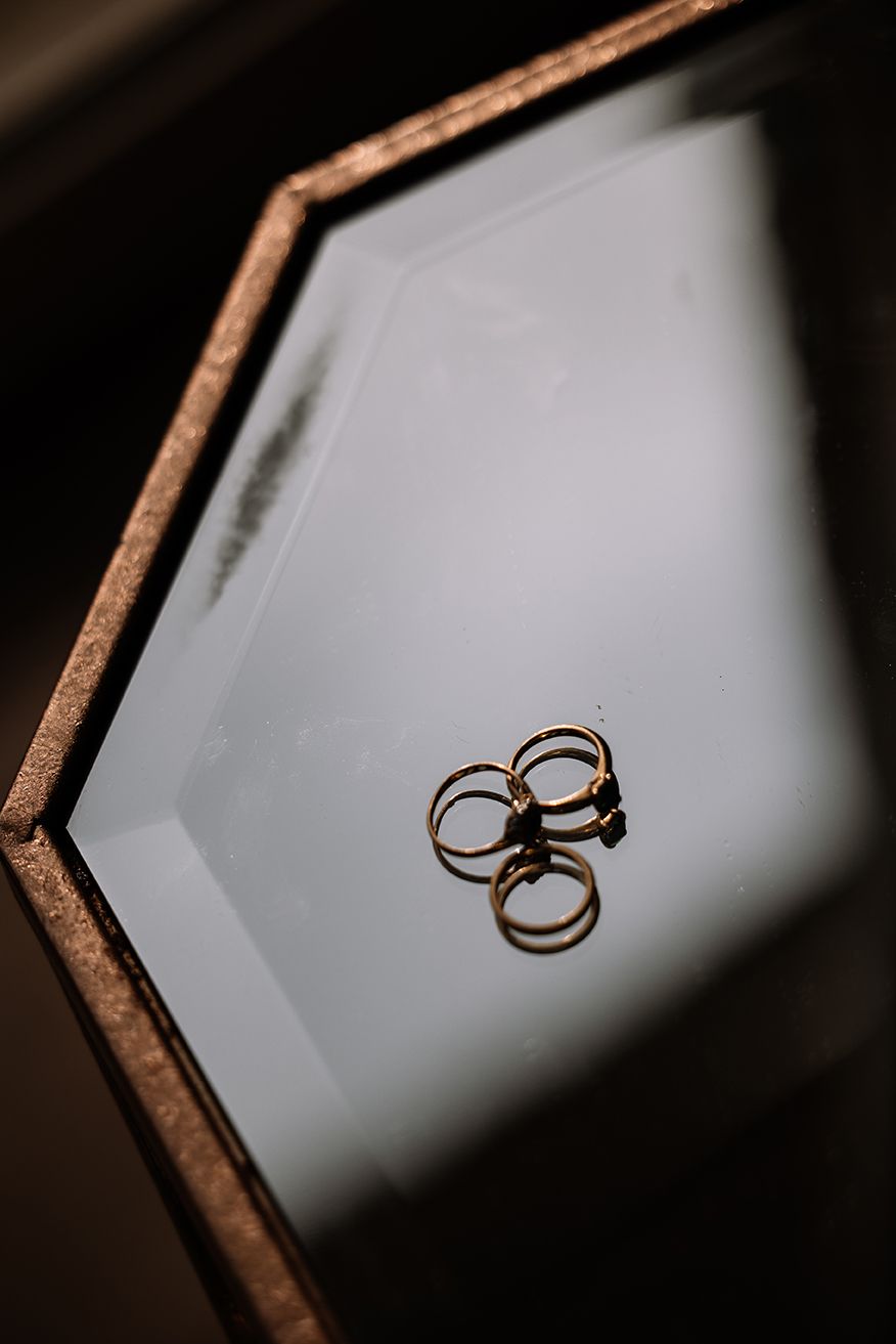 photo of brides and grooms rings. micro wedding detail photo