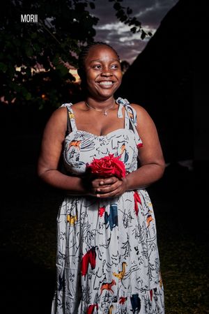 Vanessa holding flowers for a sunset session