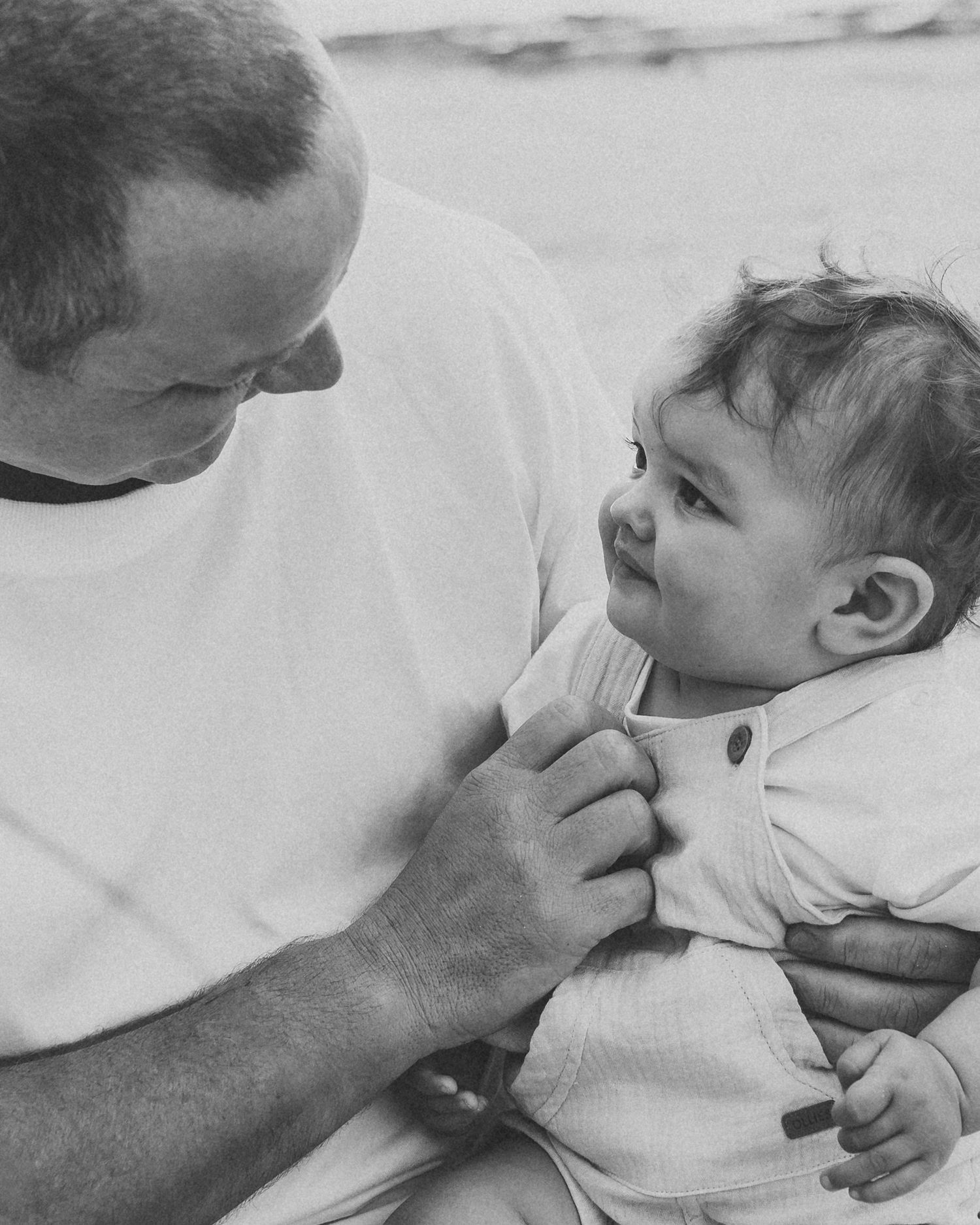 Black and white intimate close-up shots showing tender moments.