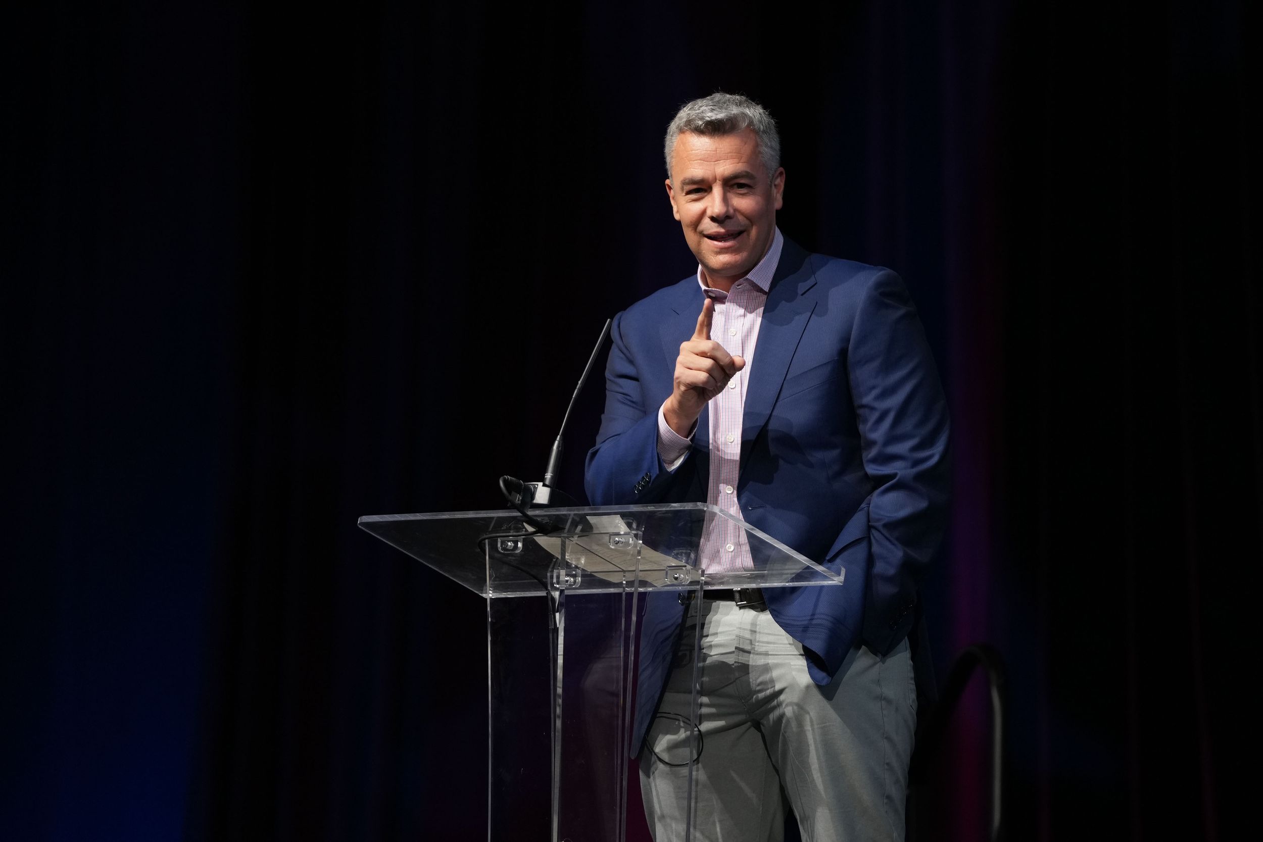 Inspirational keynote speaker Tony Bennett delivering impactful insights on leadership, resilience, and vision at a business summit.