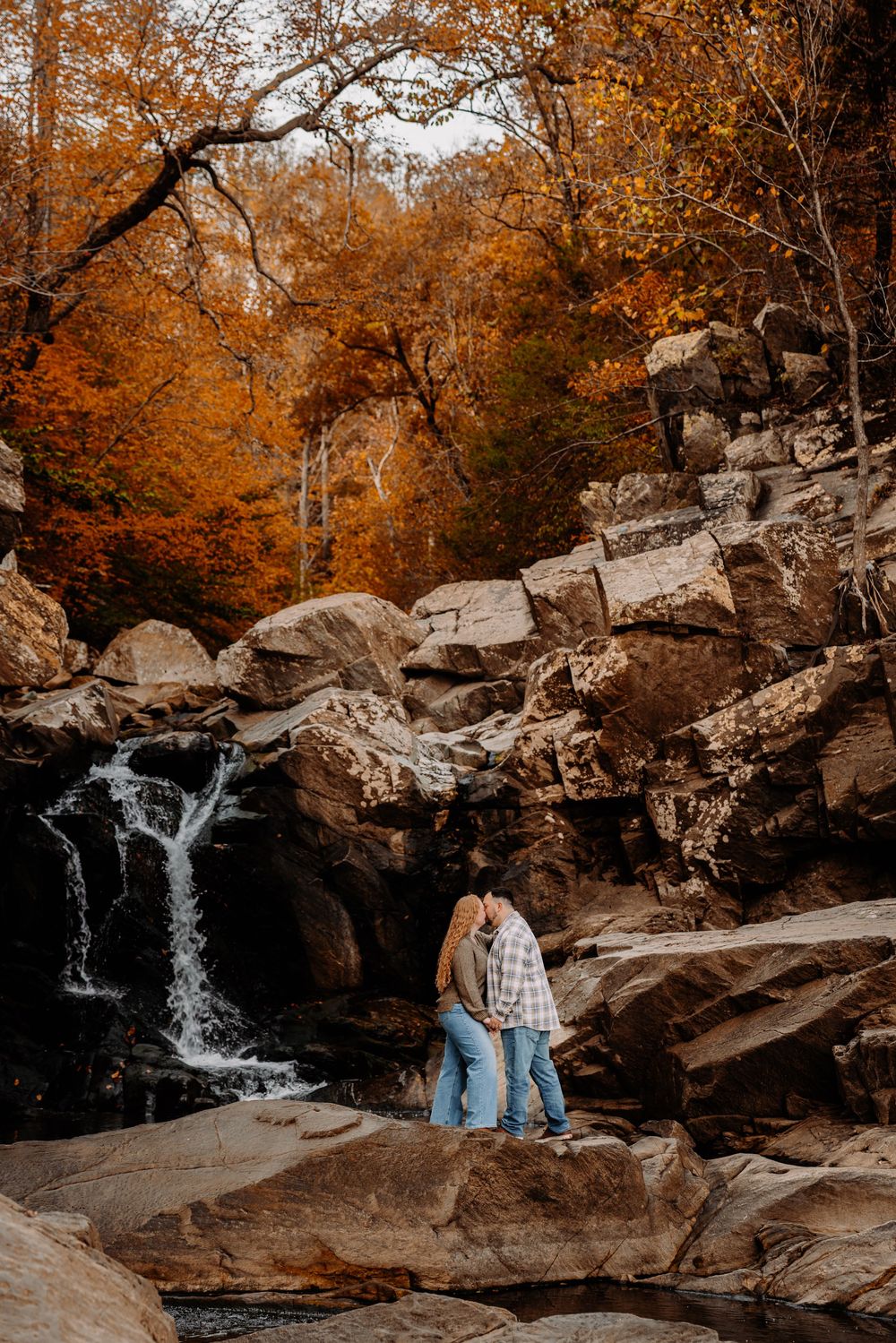 Fall Couple Engagement session by the waterfall  at Scott Run in McLean, Virginia