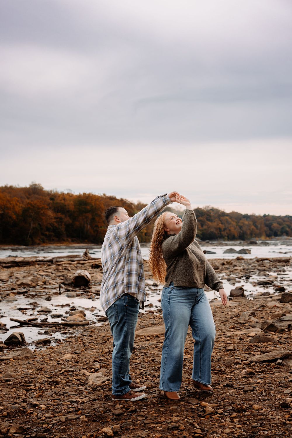 Fall Couple Engagement session at Scott Run by the Potomac River dancing in McLean, Virginia