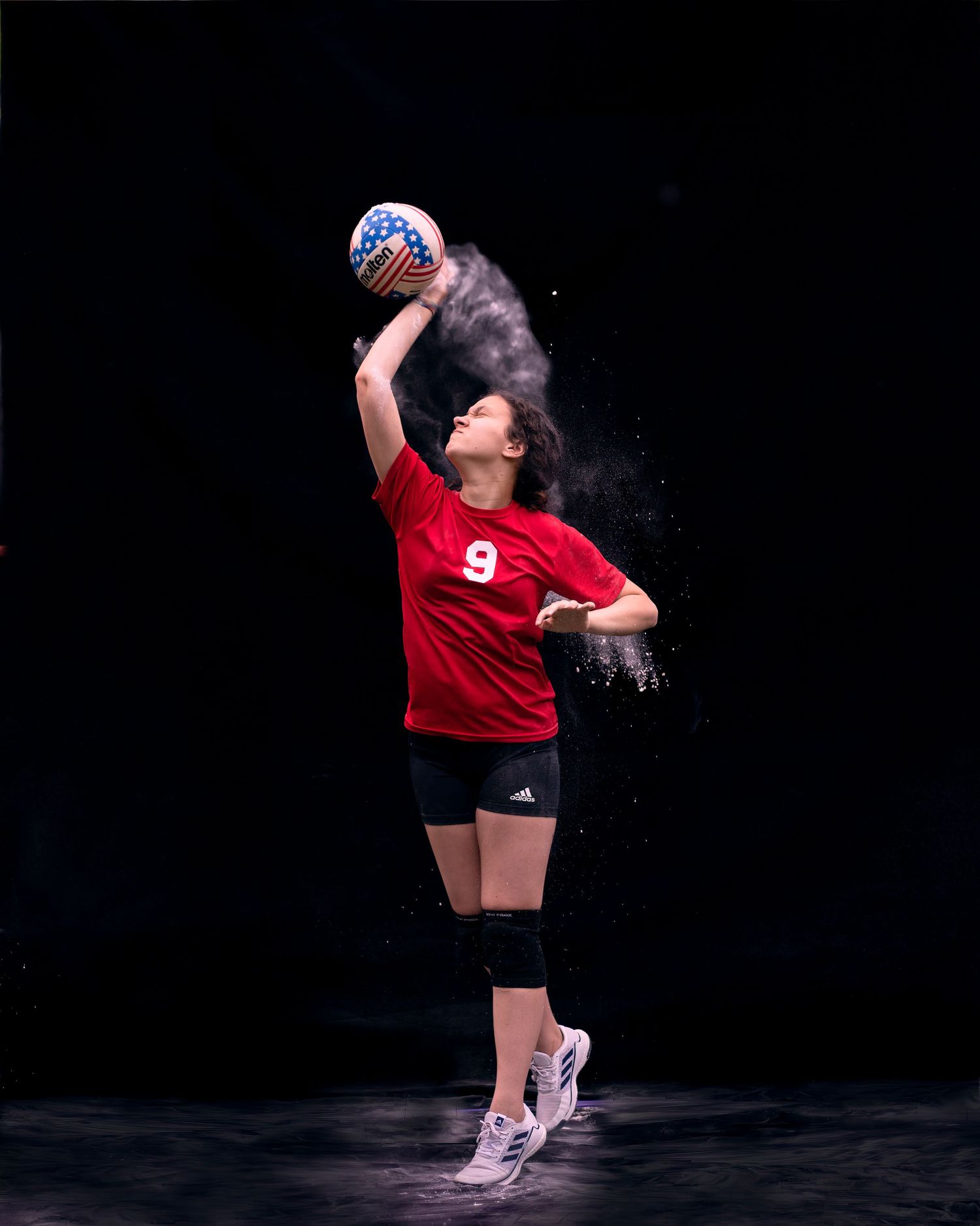 Volleyball powder photo session photographed in Bergen County New Jersey with dramatic motion