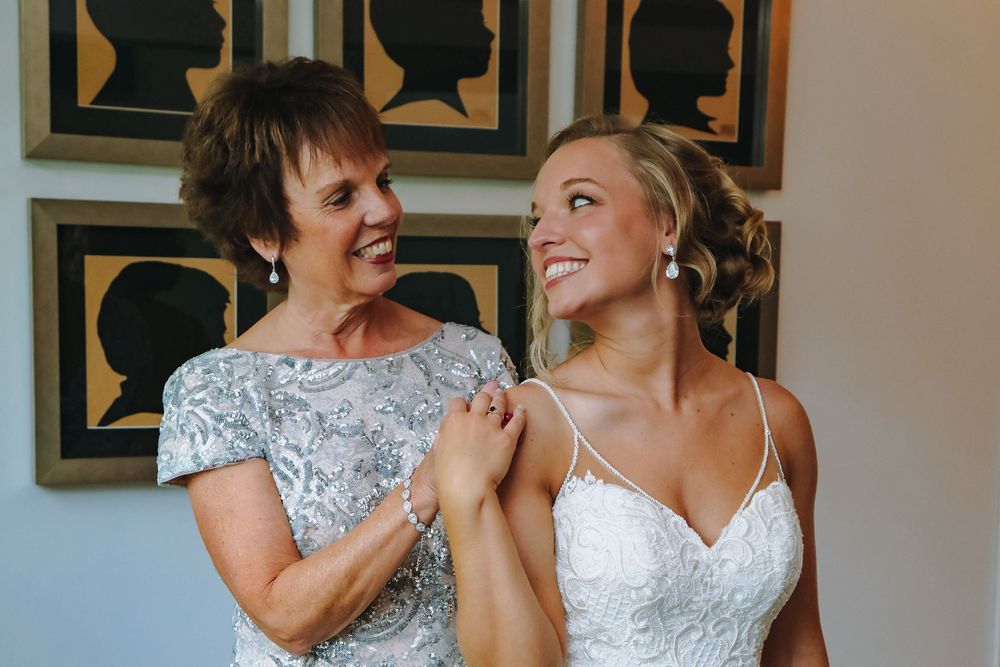 Buffalo Wedding photography, Mother of the bride and bride to be share a sweet moment during getting ready photos.