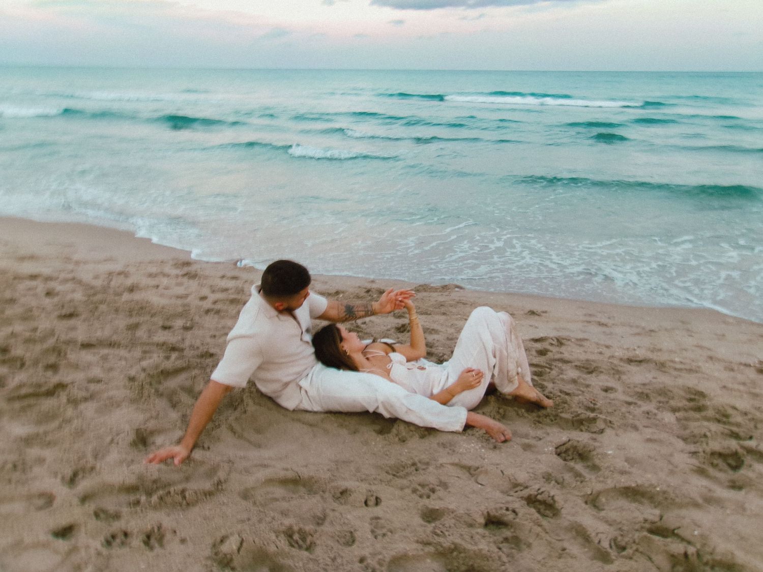 Fun at the beach celebrating love and an engagement.