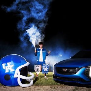 A sequence of six photos showing smoke effects and blue lighting with a University of Kentucky sports theme.