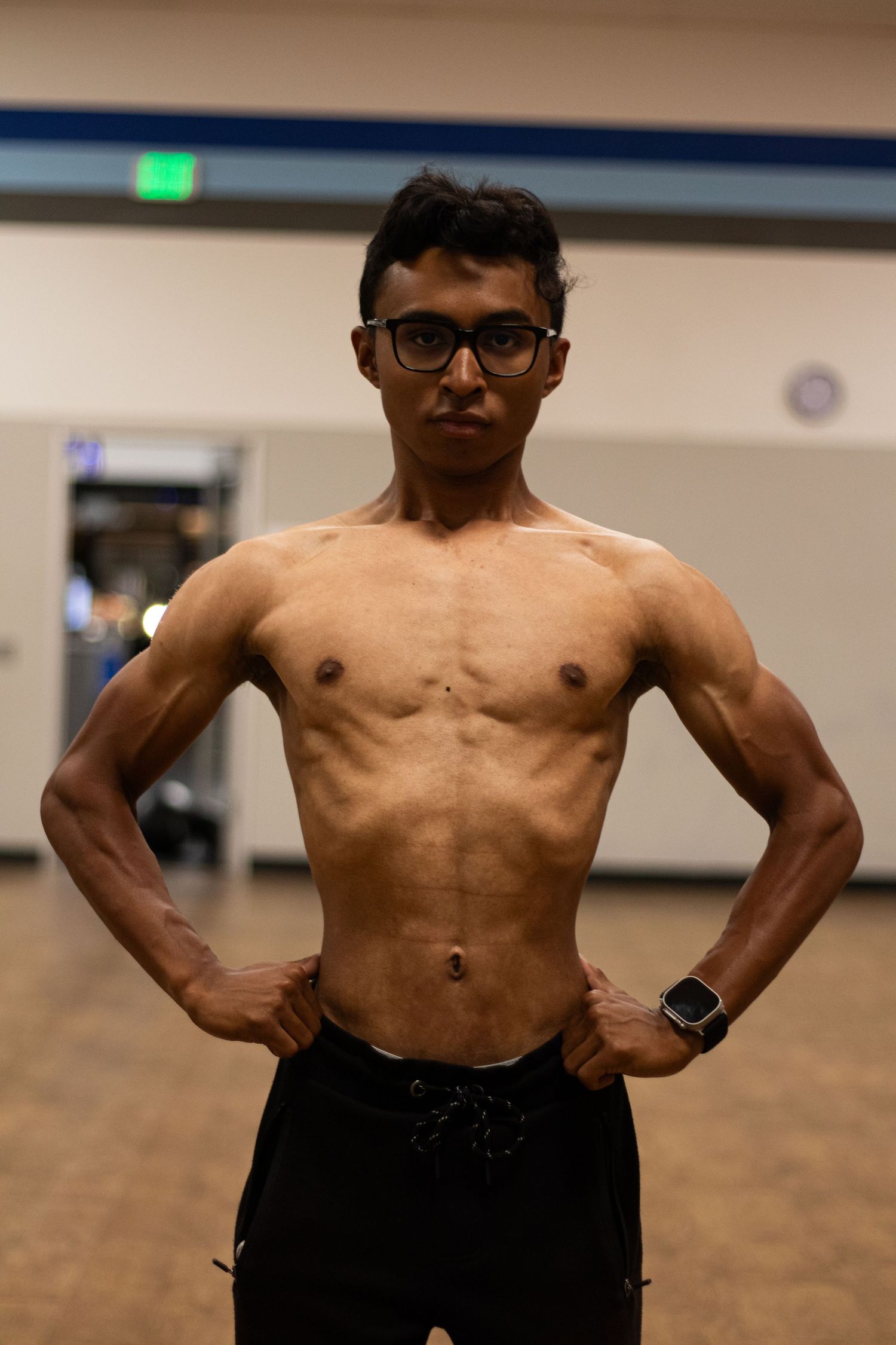Fitness photography session in Long Beach gym showing athlete posing by Justicee Photography