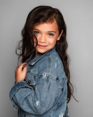Portrait of child in jean jacket
