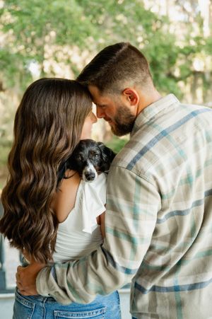 Series of intimate romantic moments between a couple wearing casual clothing against a natural backdrop.