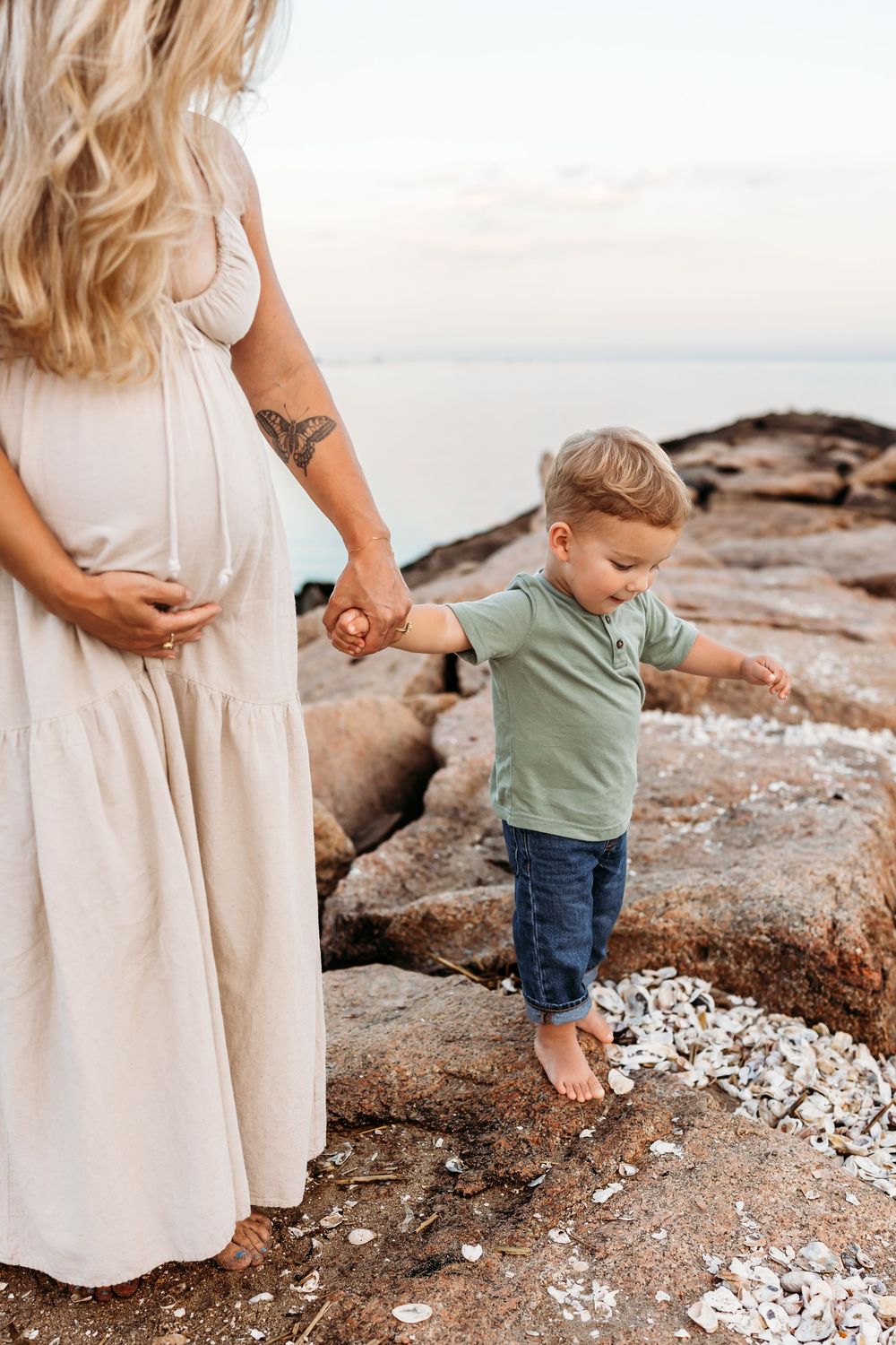 Mother and son walking at Guilford, CT in Maternity dress