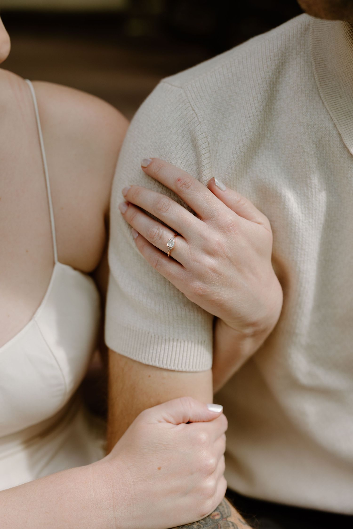 Close-up series of hands in white fabric showing delicate details and textures.