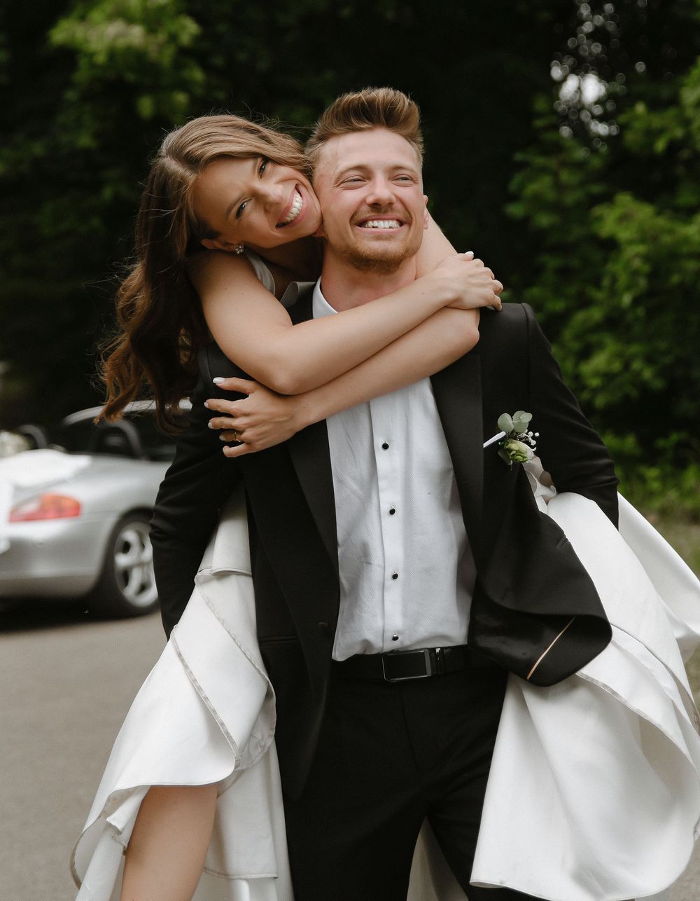 A couple in formal wedding attire share joyful embraces in a series of candid outdoor photos.