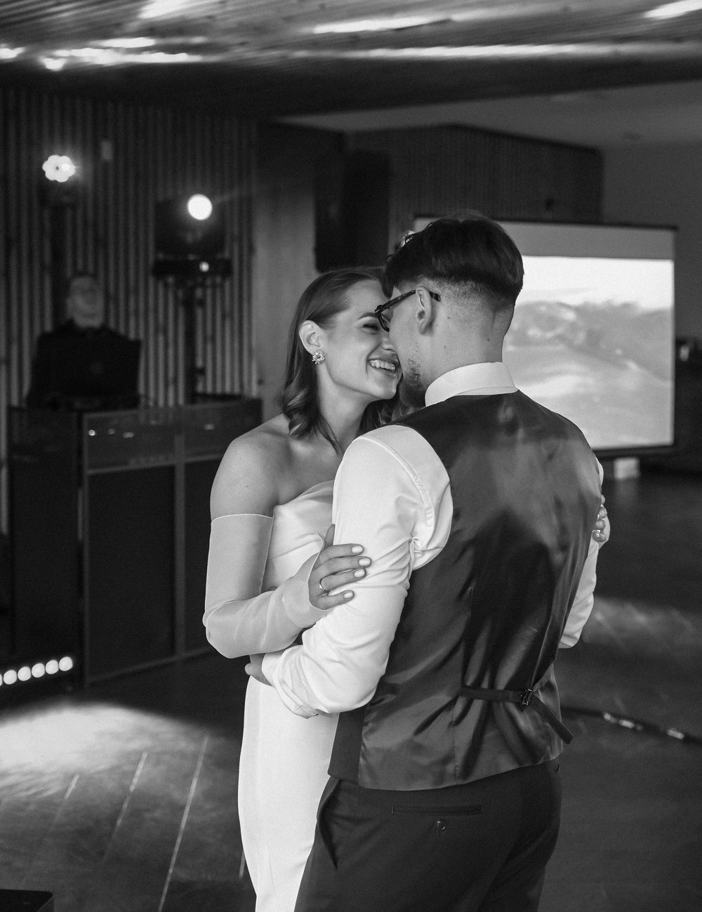 A series of black and white photos showing couples dancing together in an intimate setting.