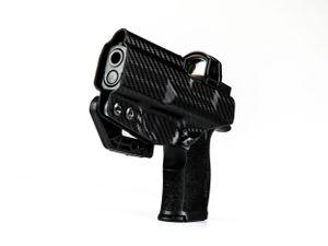 A black carbon fiber handgun holster shown against white background. Product photography.