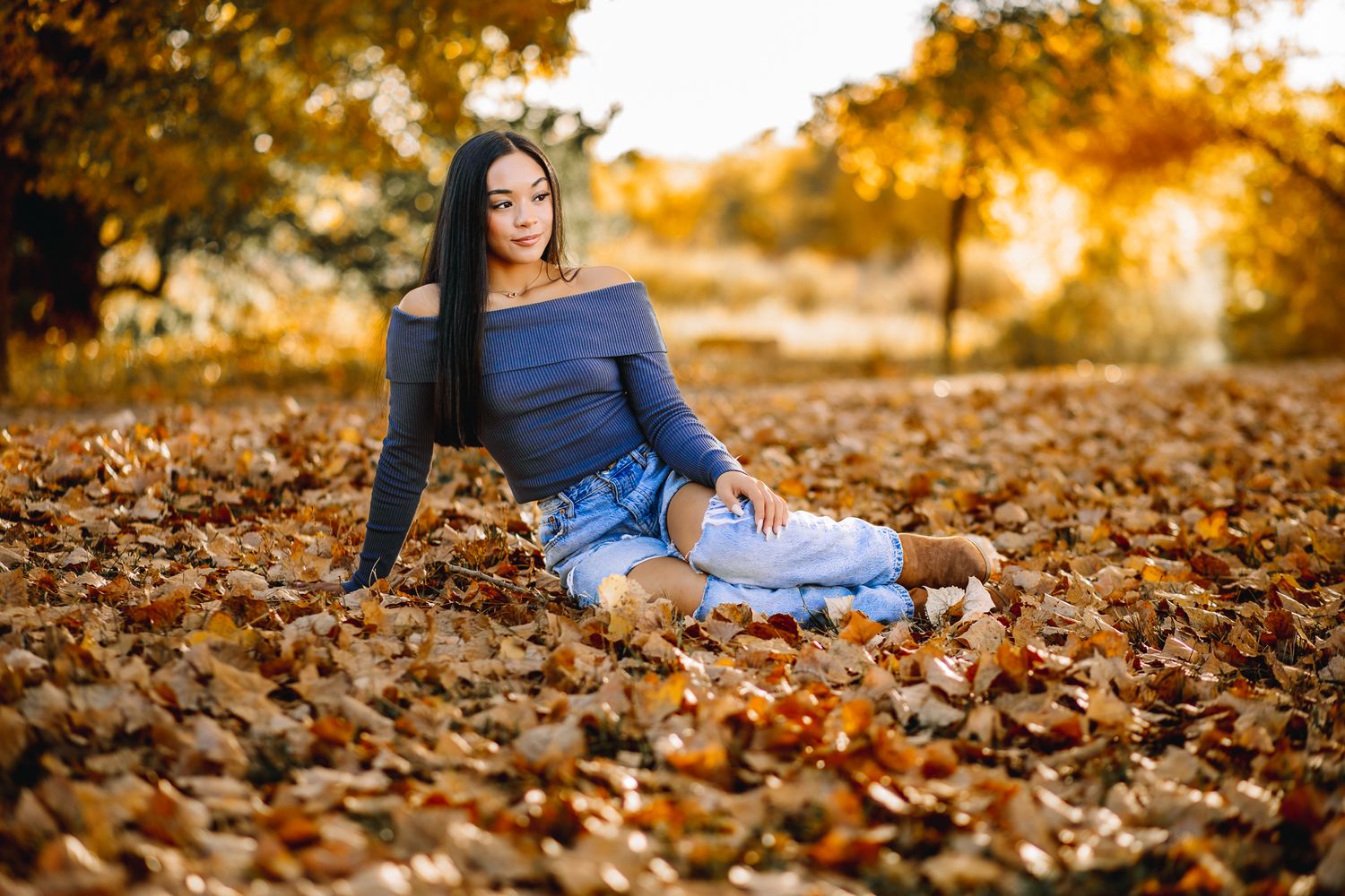 class of 2026 high school senior girl in Windsor Colorado posing for her senior pictures at golden hour in Greeley Colorado