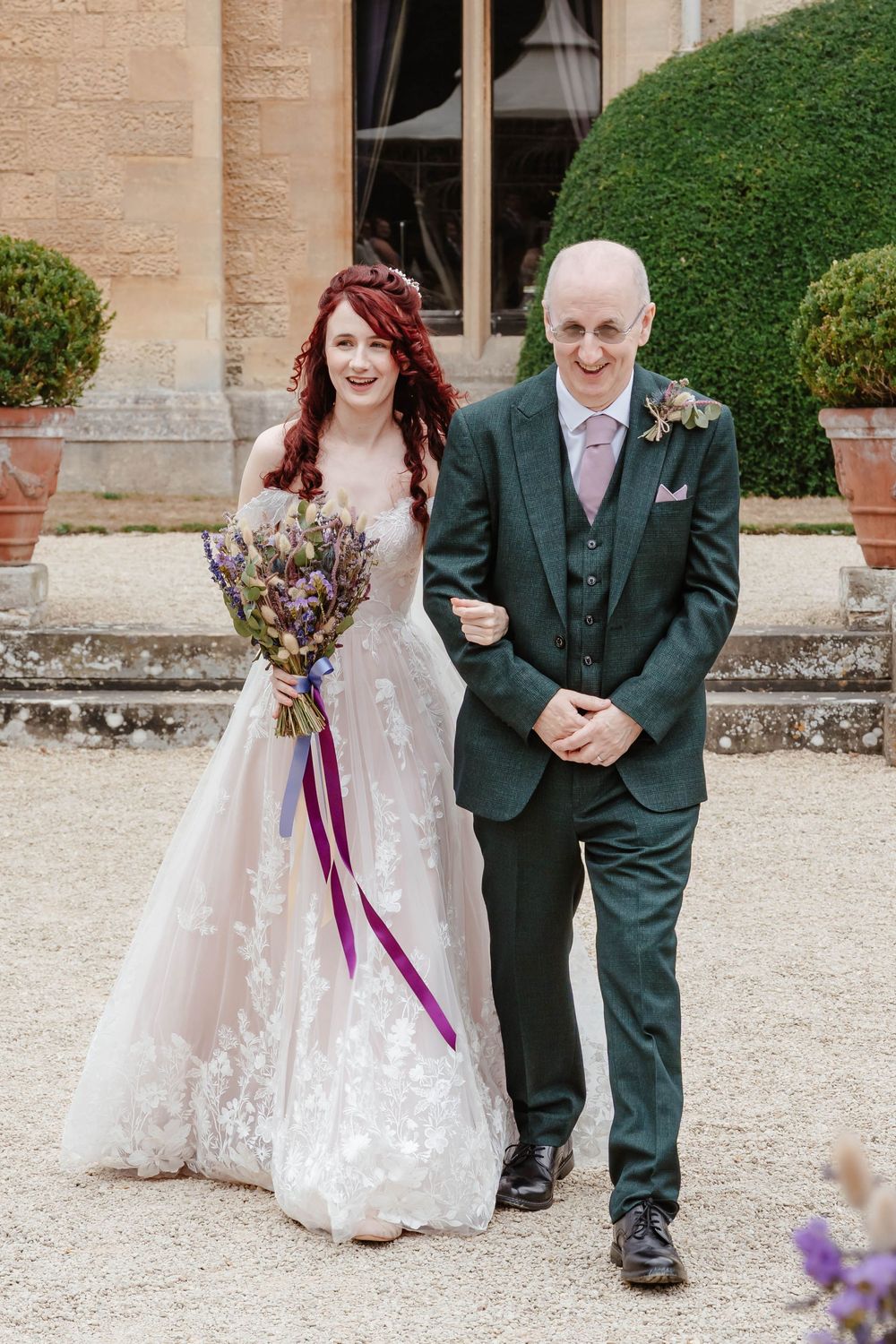 Wedding at Manor by the Lake Cheltenham Gloucestershire close up of bride and her dad