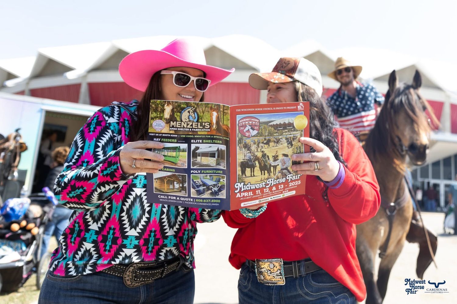 Two rodeo program booklets held up at outdoor western event with colorful attire. Wisconsin Pro Rodeo PRCA Rodeo Photographer Dakota Cardena