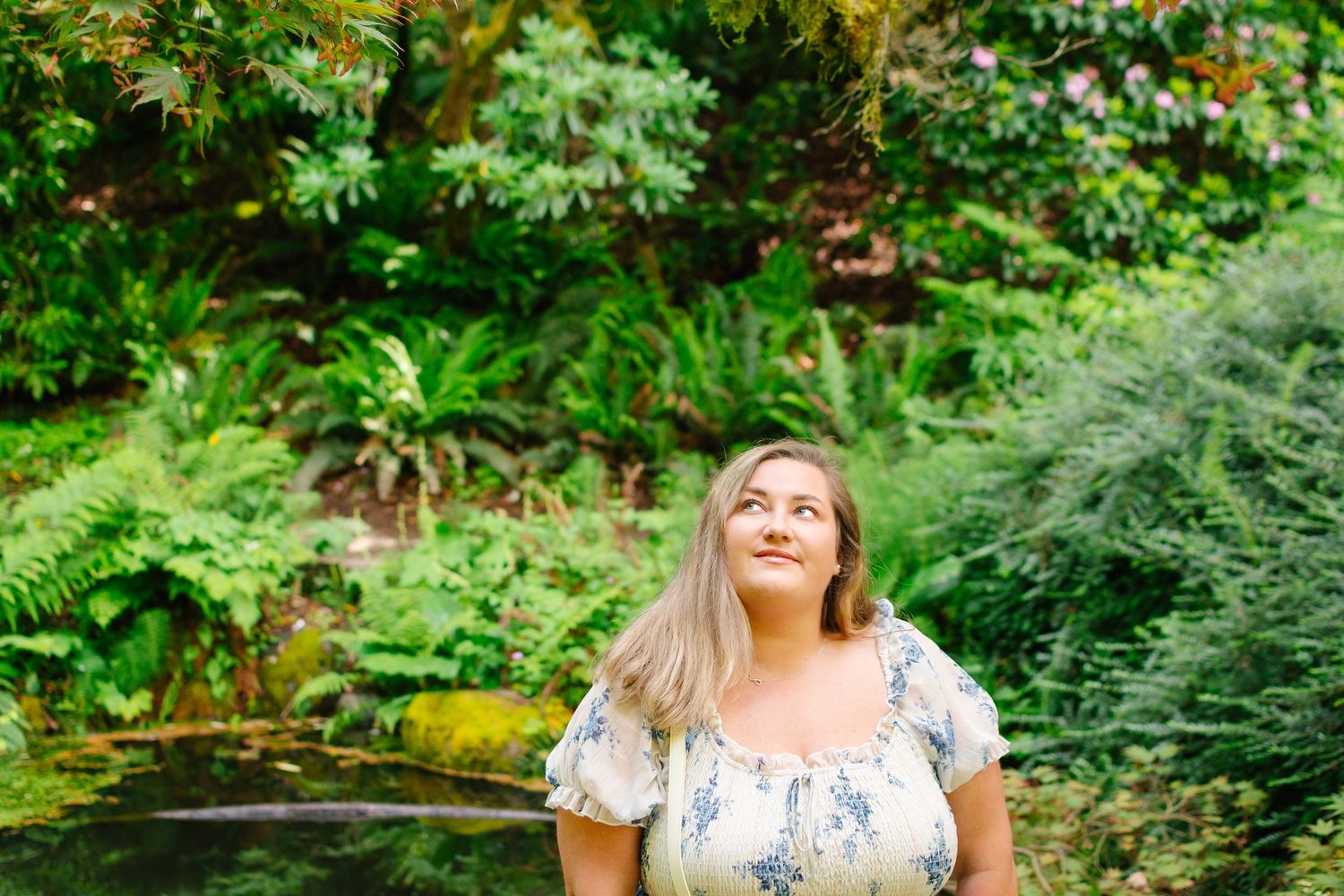 Spring portrait at Seattle Arboretum with rich greenery and soft natural light.