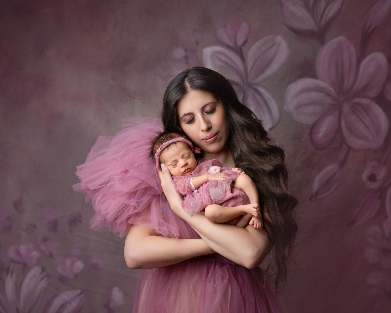 A series of dreamy maternity and newborn portraits featuring soft pink tulle dresses against a purple floral backdrop.