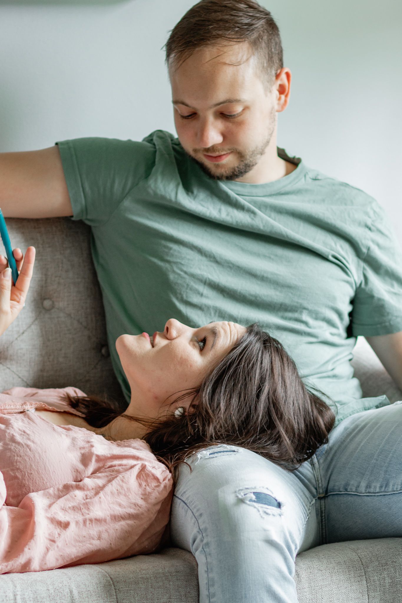 Wife holding pen and journal laying on husbands lap and looking up at him | Adventure photography session by K Murphy Photos | Roanoke VA |