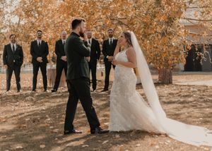First look moments captured in three parts: groom's reaction.