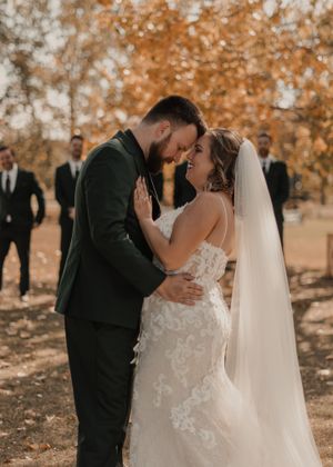 First look moments captured in three parts: their emotional embrace.