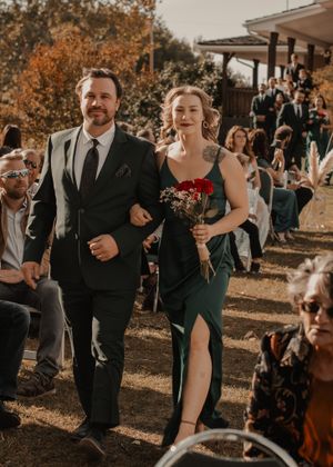 Wedding party walking down the aisle, filled with joy and excitement as they approach the altar.
