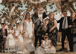 Posed family shot capturing warm smiles and togetherness in a beautifully arranged setting.