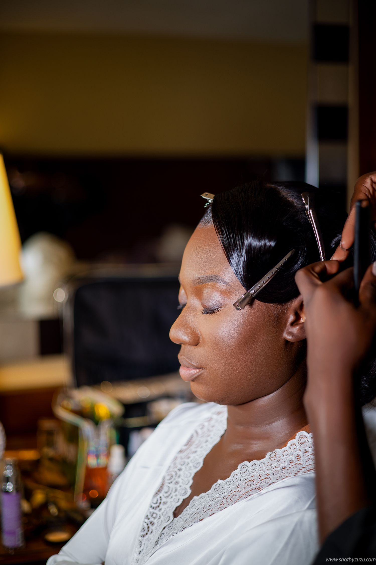 A side profile shows wedding day hair preparation with styling clips.