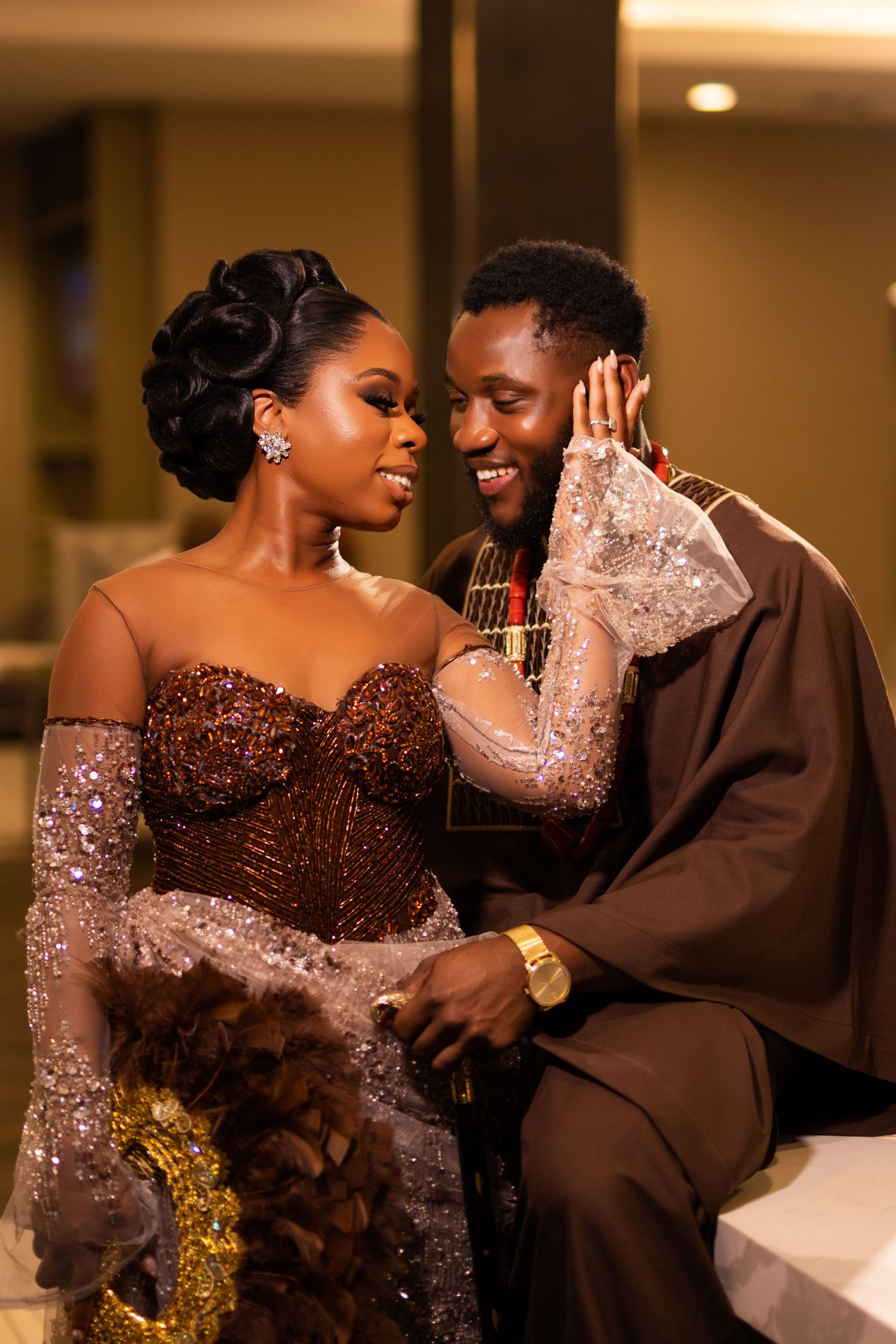 Romantic close-up of couple sharing tender moment in formal wedding attire.