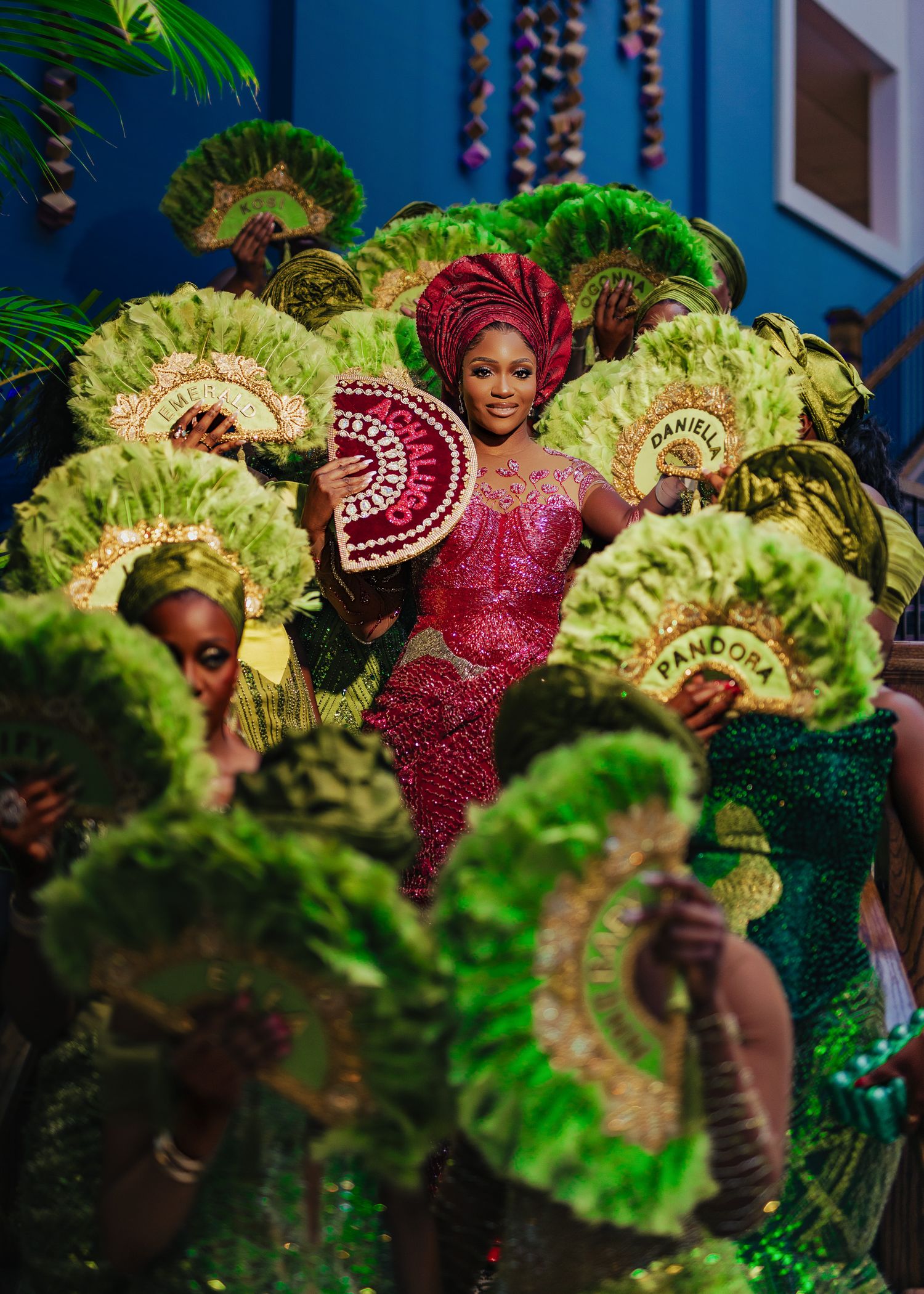 Dramatic photos featuring vibrant green and red carnival costume with feathers and sequins.