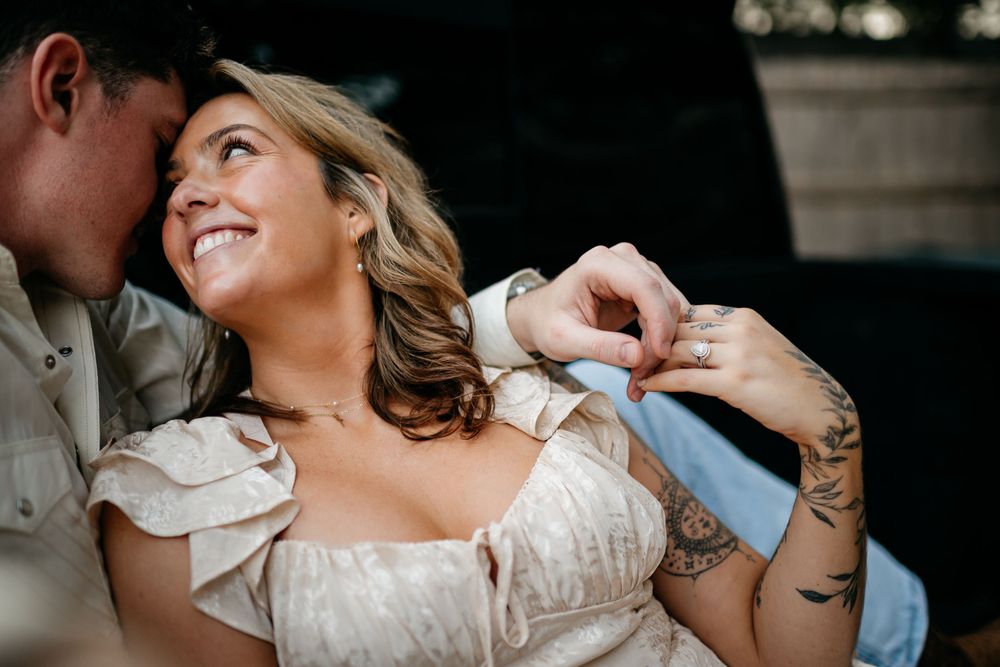Close-up shot of an intimate dance moment between a couple in formal attire.