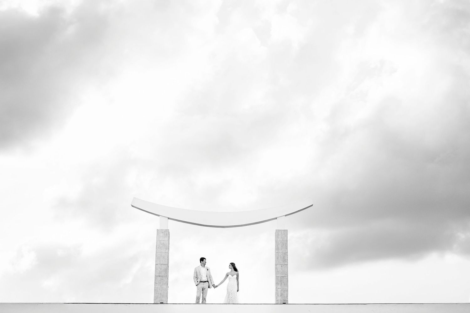 Light, colorful beach wedding at Majestic Elegance Costa Mujeres. Parker and Jadie’s destination wedding.