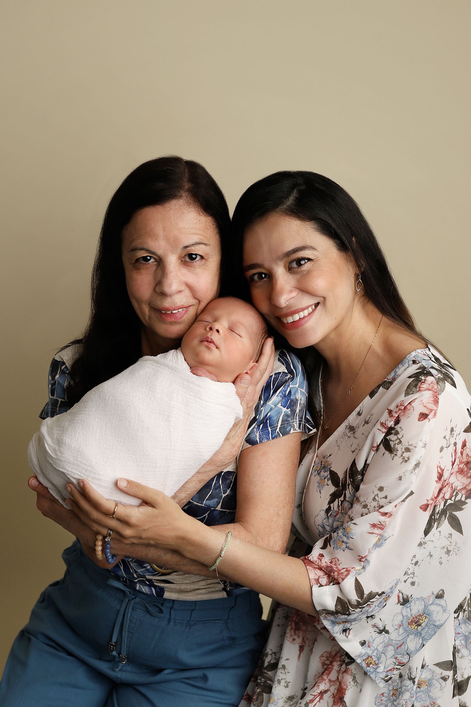 A series of candid portrait photos showing joyful embraces and smiles against a neutral background.