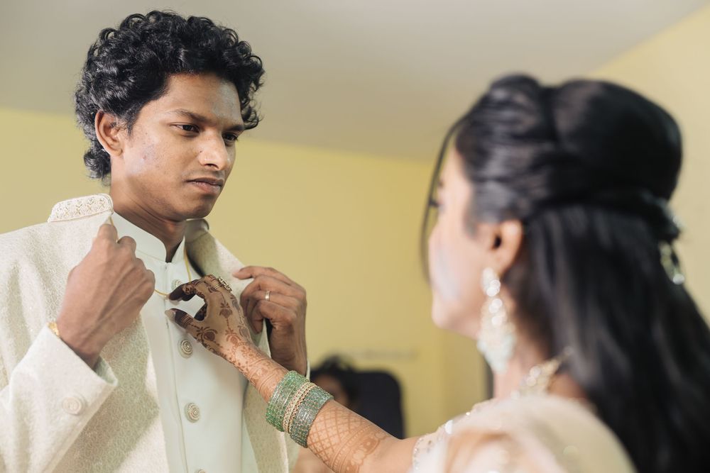 Getting ready sequence showing wedding preparations in a room with yellow walls.