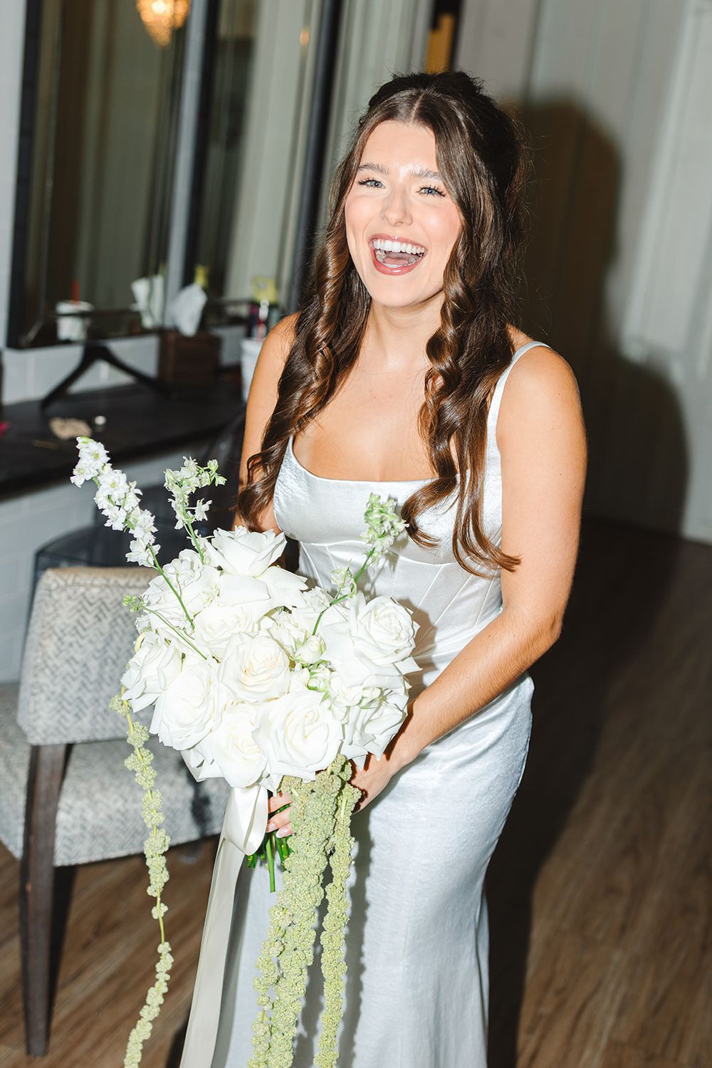 A series of joyful photos shows someone in a white dress holding a beautiful white floral bouquet.
