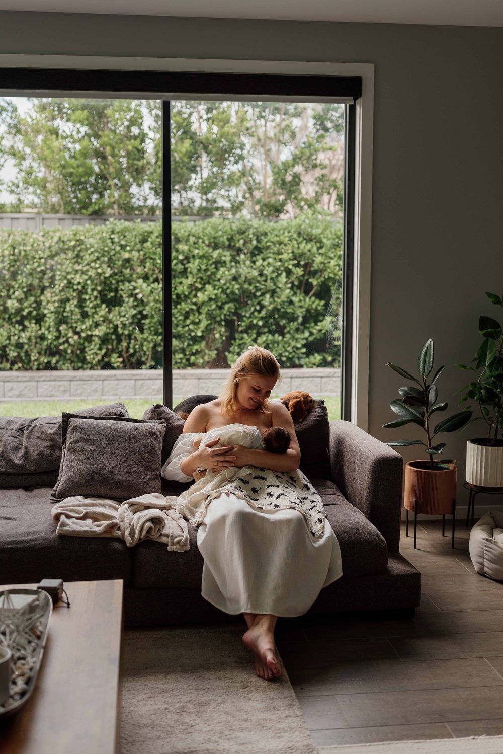 Newborn photoshoot at home in lounge room Sydney Hills District.