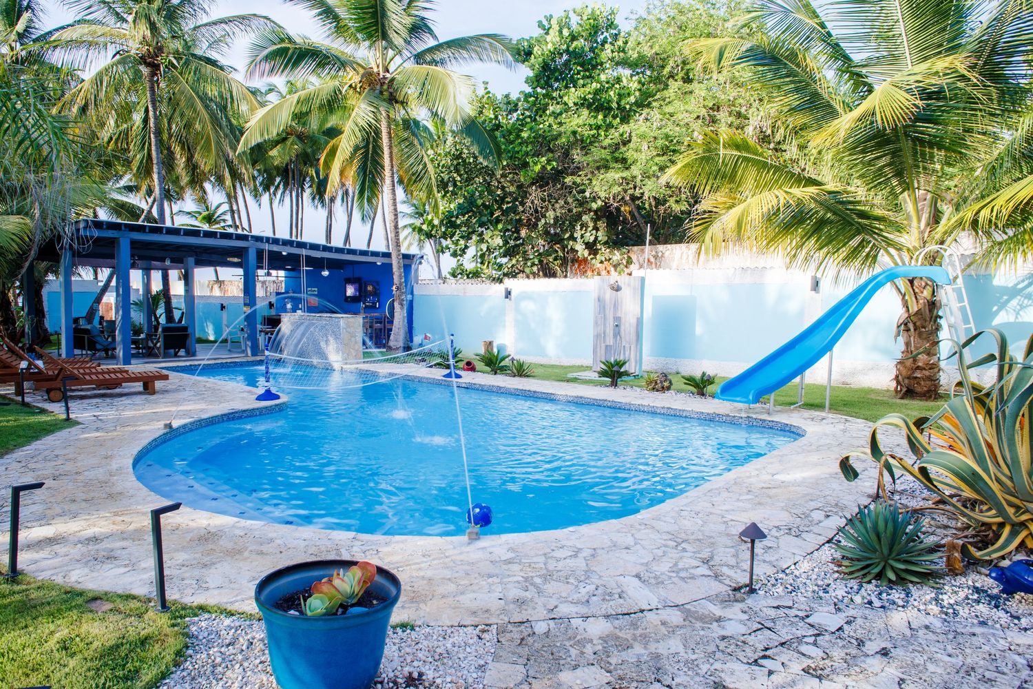 Real estate photography. Backyard pool and covered patio area. Vega Baja, Puerto Rico.