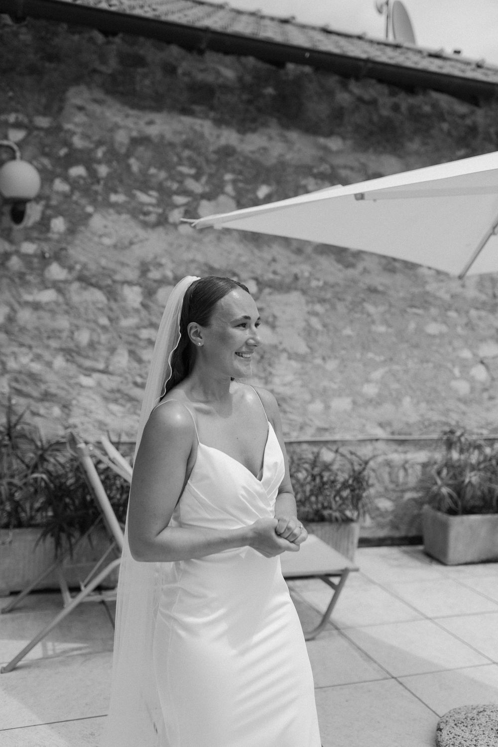 Bride walks to her groom at Villa Belvedere Argegno Lake Como.