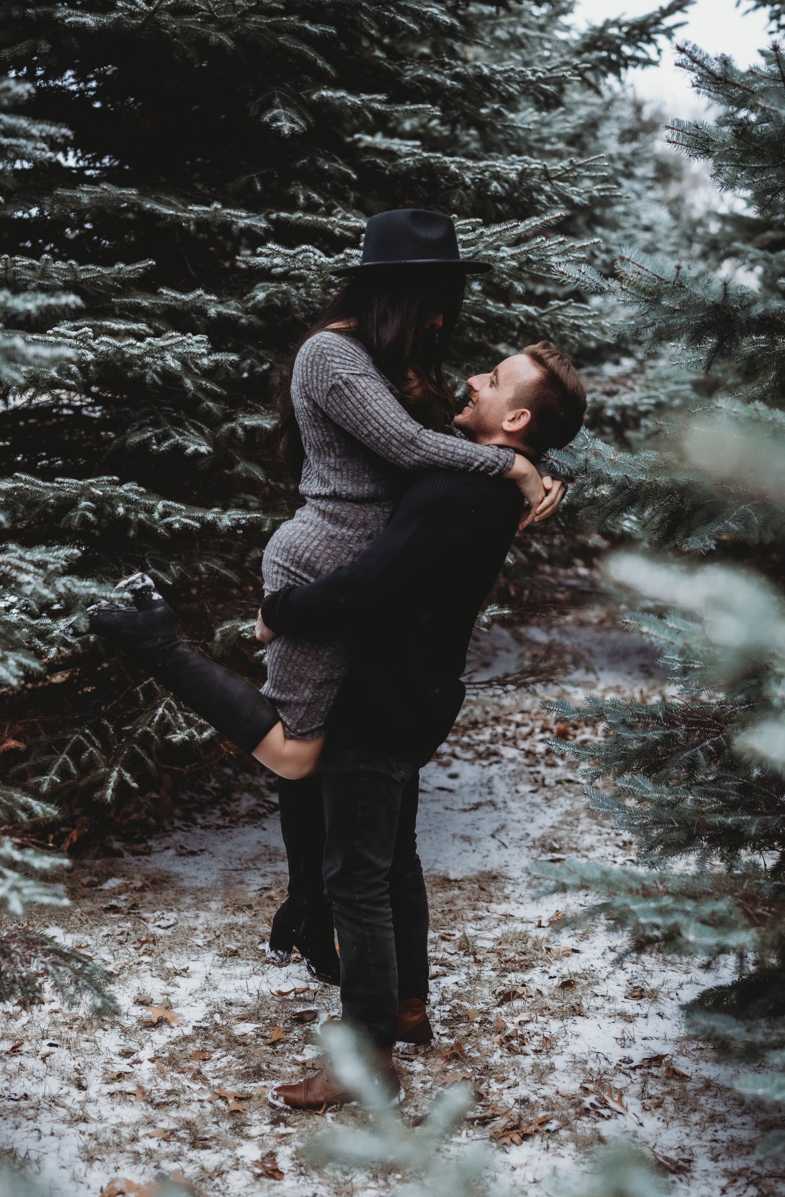 engagement photo, in pine trees, winter photo