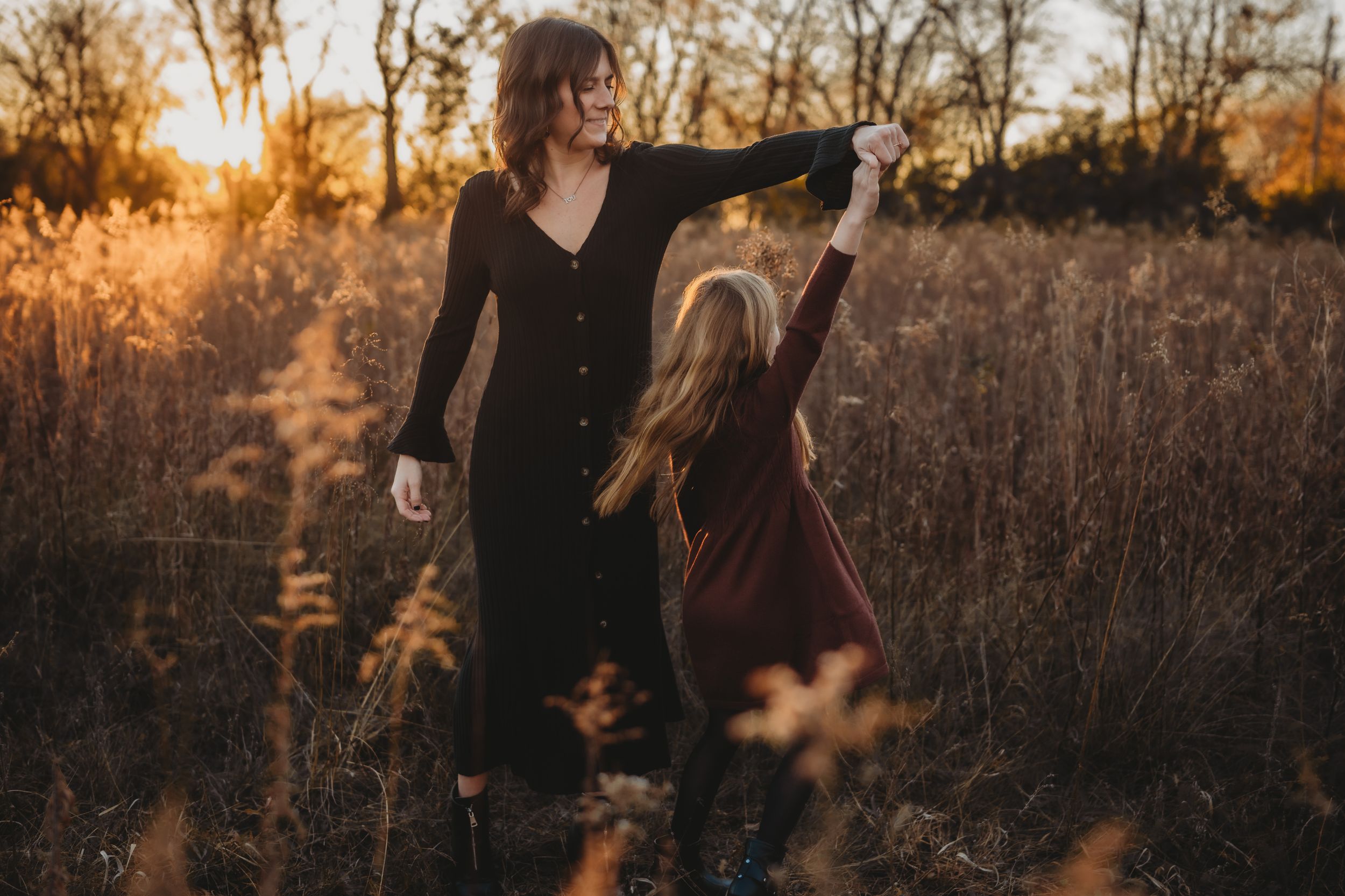 family photo, sunset, golden hour, in a field