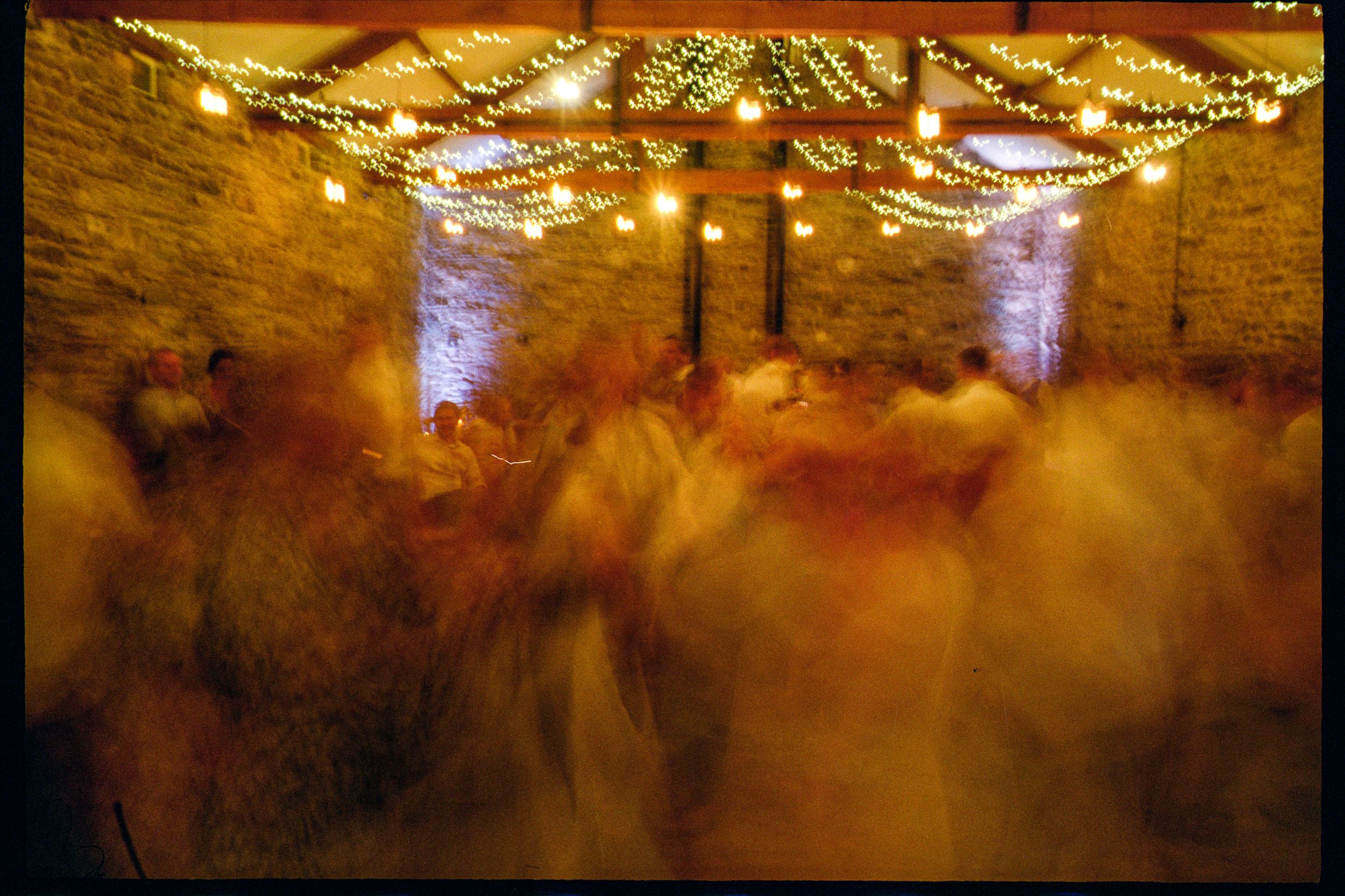Wedding Ceiligh at New House farm captured on 35mm film. Wedding film photography.