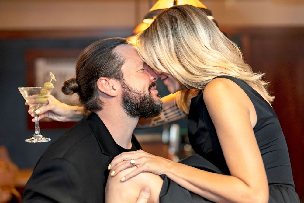 Romantic sequence showing intimate moments between couple in formal black attire.