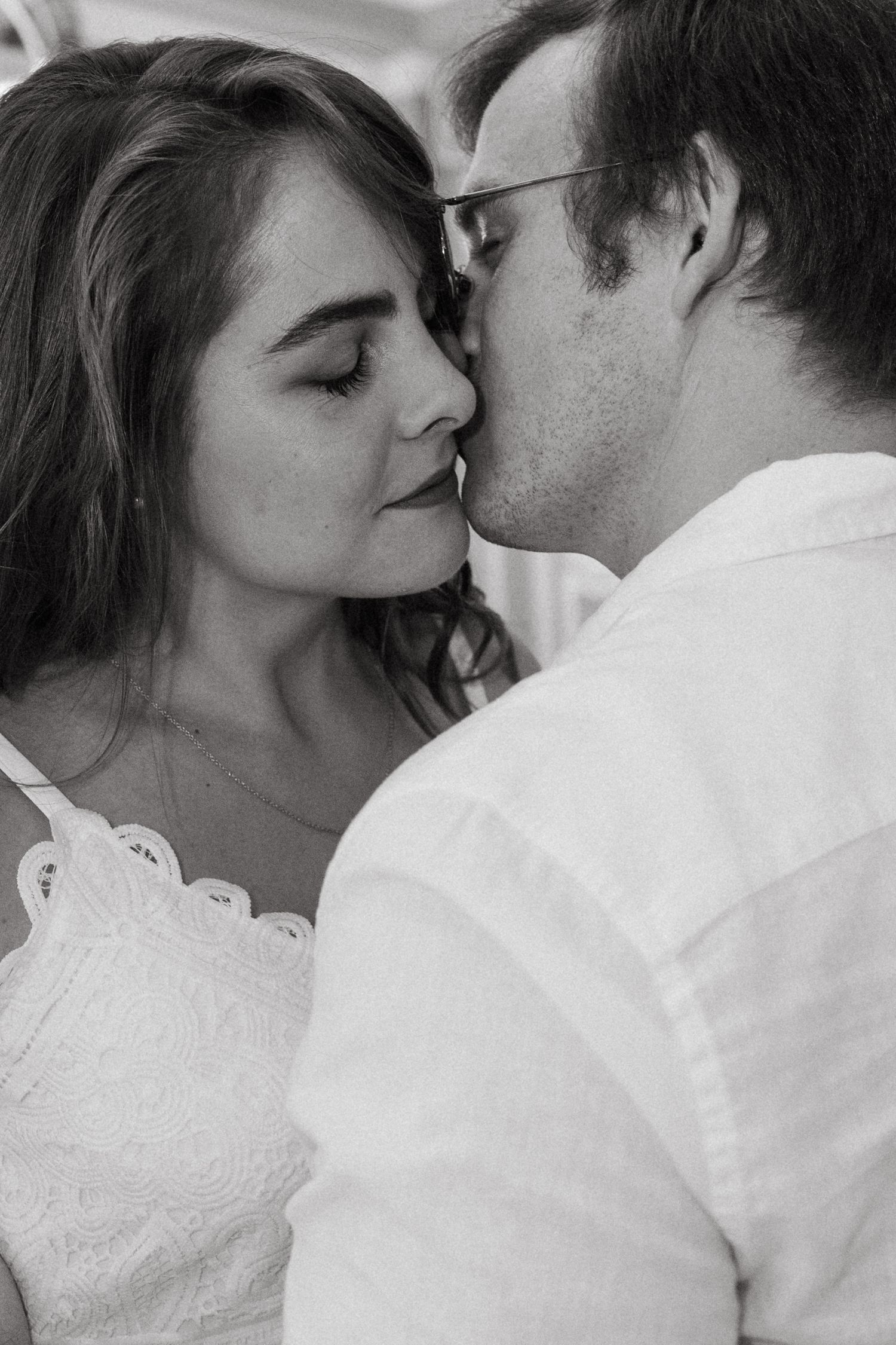 Intimate close-up sequence of a couple sharing tender moments.
