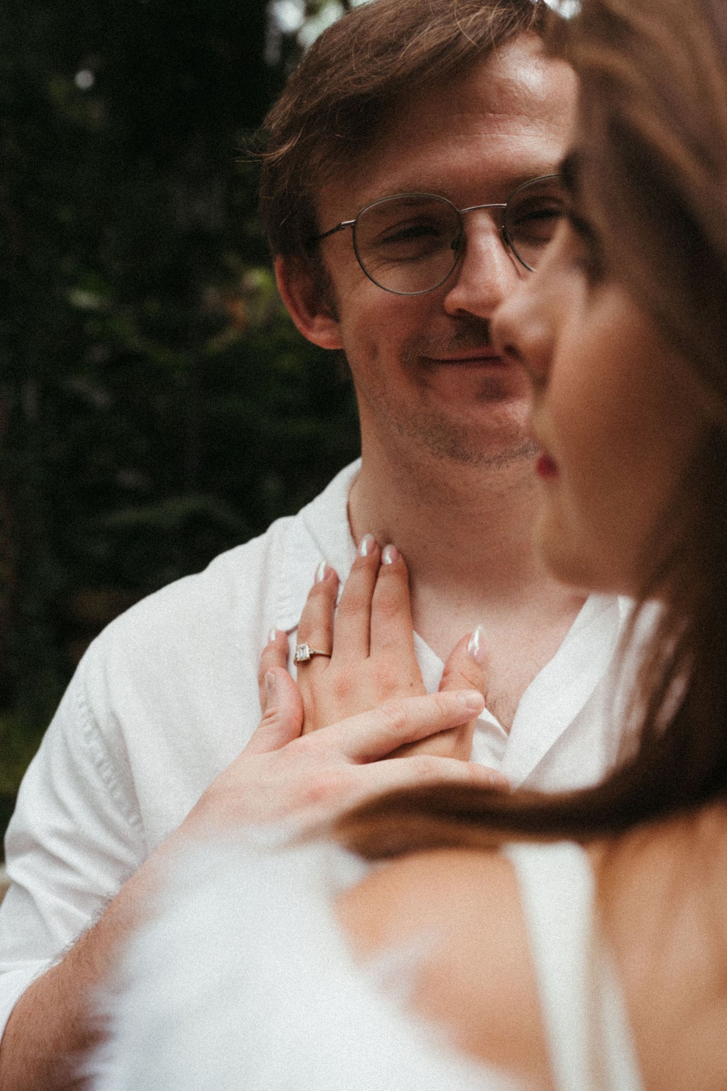 Close-up series of tender moments between a couple in natural lighting.